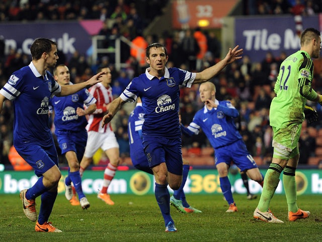Leighton Baines of Everton celebrates scoring the equaliser from the penalty spot during the Barclays Premier League match between Stoke City and Everton at Britannia Stadium on January 01, 2014