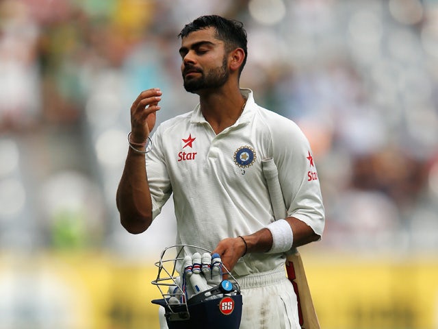 Australia declare on 318-9 at lunch