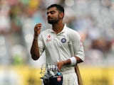 Virat Kohli of India walks from the field after being dismissed for 169 during day three of the Third Test match between Australia and India at Melbourne Cricket Ground on December 28, 2014