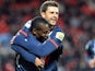 Paris Saint-Germain's Italian midfielder Thiago Motta celebrates with French midfielder Blaise Matuidi after scoring a goal during the French Cup football match between Brest and PSG at the Francis Le Ble stadium in Brest, western France, on January 8, 20