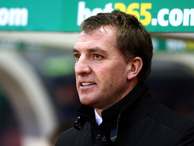 Liverpool manager Brendan Rodgers looks on prior to kick-off against Stoke during their Premier League match on January 12, 2014