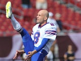 Punter Brian Moorman #8 of the Buffalo Bills warms up for play against the Tampa Bay Buccaneers December 8, 2013