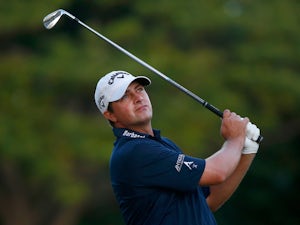 Brian Stuard plays a shot on the 15th hole during the second round of the Sony Open in Hawaii at Waialae Country Club on January 10, 2014
