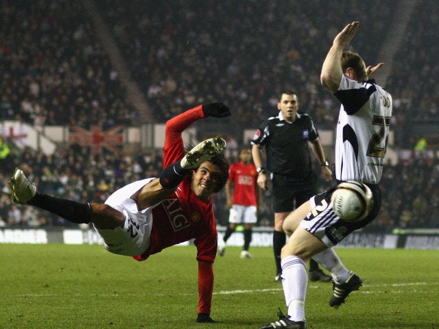 Carlos Tevez, then of Manchester United, attempts a shot against Derby County on January 07, 2009.