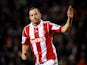 Stoke's Charlie Adam celebrates after scoring his team's second goal against Liverpool during their Premier League match on January 12, 2014