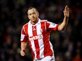 Stoke's Charlie Adam celebrates after scoring his team's second goal against Liverpool during their Premier League match on January 12, 2014