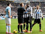 Newcastle's Cheik Tiote argues with referee Mike Jones after his goal is disallowed for offside against Manchester City during their Premier League match on January 12, 2014