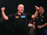 Christian Kist of the Netherlands celebrates after winning the Lakeside World Professional Darts Championship final match played against Tony O'Shea of England at Lakeside, Frimley Green, on January 15, 2012