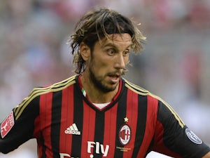 Milan's defender Cristian Zaccardo plays the ball during the Audi Cup football match AC Milan vs Sao Paolo FC in Munich, southern Germany, on August 1, 2013