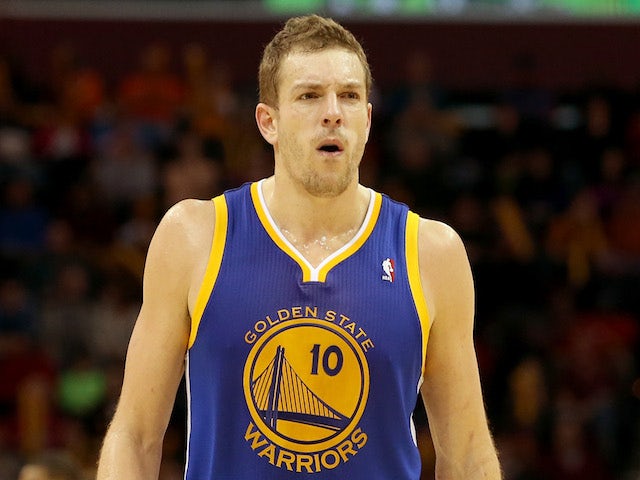 David Lee of the Golden State Warriors walks up court after a play in the fourth quarter against the Cleveland Cavaliers at Quicken Loans Arena on December 29, 2013 