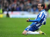 David Lopez of Brighton celebrates scoring the their second goal during the npower Championship match between Brighton & Hove Albion and Crystal Palace on March 17, 2013