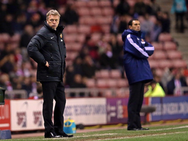 Manchester Uniteds Scottish manager David Moyes looks on during a League Cup semi-final first leg match between Sunderland and Manchester United at the Stadium of Light on January 7, 2014