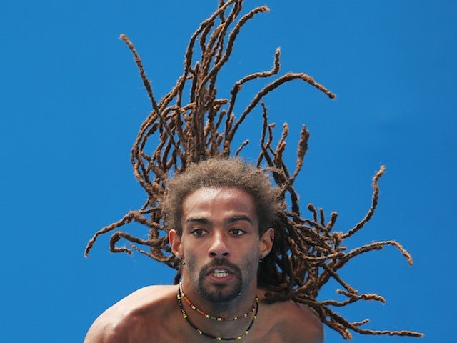 Dustin Brown of Germany practices for the Australian Open in Melbourne on January 6, 2014