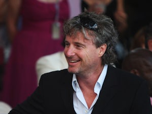 Former F1 driver Eddie Irvine attends the Amber Fashion Show and Auction held at the Meridien Beach Plaza on May 23, 2008