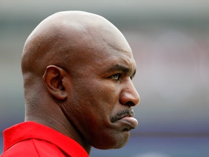 Former World Heavyweight Boxing Champion Evander Holyfield looks on during the game against the Western Kentucky Hilltoppers facing the Alabama Crimson Tide at Bryant-Denny Stadium on September 8, 2012