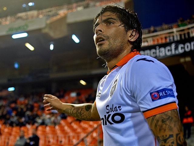 Valencia's Ever Banega in action against Kuban during their Europa League match on December 12, 2013