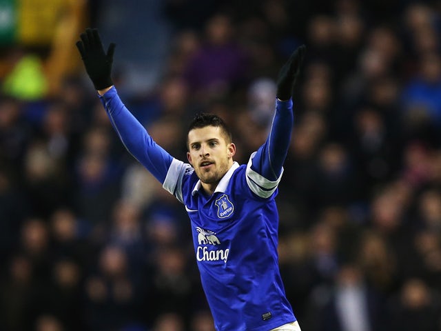 Kevin Mirallas of Everton celebrates his goal during the Barclays Premier League match between Everton and Norwich City at Goodison Park on January 11, 2014
