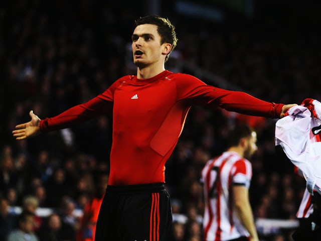 Adam Johnson of Sunderland celebrates scoring his sides third goal during the Barclays Premier League match between Fulham and Sunderland at Craven Cottage on January 11, 2014
