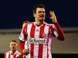 Adam Johnson of Sunderland celebrates scoring a hat trick during the Barclays Premier League match between Fulham and Sunderland at Craven Cottage on January 11, 2014
