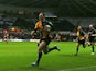 Northampton Saints' George North sprints ahead to score a try against Ospreys during their Heineken Cup match on January 12, 2014