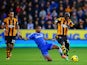 Ashley Cole of Chelsea tackles Yannick Sagbo of Hull City during the Barclays Premier League match between Hull City and Chelsea at KC Stadium on January 11, 2014