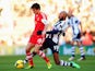 Jack Cork (L) of Southampton holds off the challenge of Nicolas Anelka (R) of West Bromwich Albion during the Barclays Premier League match on January 11, 2014