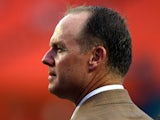 General Manager Jeff Ireland of the Miami Dolphins watches prior to his team playing against the Tampa Bay Buccaneers at Sun Life Stadium on August 24, 2013