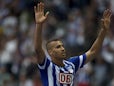 Hertha's defender John Anthony Brooks celebrates after scoring during the German first division Bundesliga match Hertha Berlin vs Eintracht Frankfurt in Berlin, on August 10, 2013