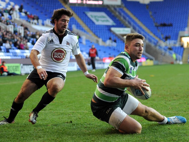 Tom Fowlie of London Irish goes over to score a try during the Amlin Challenge Cup match between London Irish and Lusitanos XV at Madejski Stadium on January 11, 2014