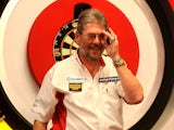 Martin Adams of England smiles after winning against David Cameron of Canada on day one of the BDO Lakeside World Professional Darts Championships at Lakeside Complex on January 4, 2014