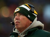 Head coach Mike McCarthy of the Green Bay Packers looks on against the San Francisco 49ers during their NFC Wild Card Playoff game at Lambeau Field on January 5, 2014