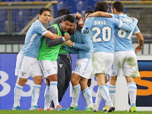 Miroslav Klose of Lazio celebrates with his teammates after scoring the opening goal during the Serie A match against Inter Milan on January 6, 2014