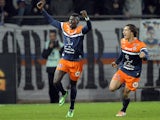 Montpellier's French forward Mbaye Niang reacts next to Montpellier's Benjamin Stambouli after scoring a goal during the French L1 football match Montpellier vs Monaco at Mosson stadium in Montpellier, southern France, on January 10, 2013