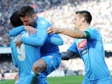 Dries Mertens of Napoli celebrates with team mates after scoring the opening goal during the Serie A match between SSC Napoli and UC Sampdoria at Stadio San Paolo on January 6, 2014