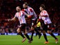 Phil Bardsley of Sunderland celebrates with team mates Steven Fletcher and Ki Sung-Yong after Manchester United's Ryan Giggs scores an own goal on January 7, 2014