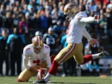 Phil Dawson of the San Francisco 49ers kicks a field goal in the first quarter against the Carolina Panthers on January 12, 2014