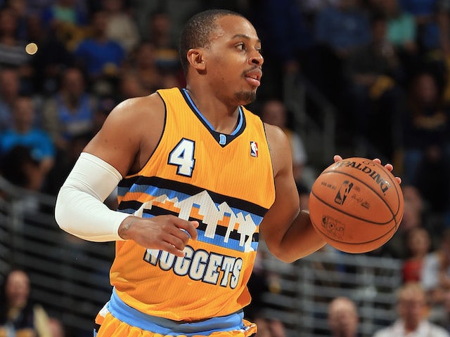 Randy Foye of the Denver Nuggets controls the ball against the Portland Trail Blazers at Pepsi Center on November 1, 2013