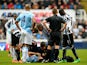 Samir Nasri of Manchester City receives medical attention after the tackle from Mapou Yanga-Mbiwa of Newcastle during the Barclays Premier League match on January 12, 2014