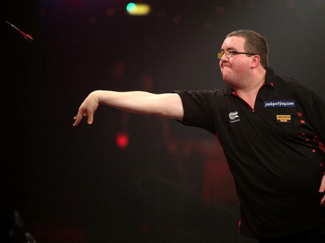 Stephen Bunting of England in action during his first round match against Jim Widmayer of USA during one of the BDO Lakeside World Professional Darts Championships at Lakeside Complex on January 07, 2014 