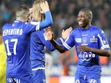 Bastia's Mauritanian midfielder Adama Ba is congratulated by teammates after scoring during the French L1 football match against Bordeaux on January 18, 2014