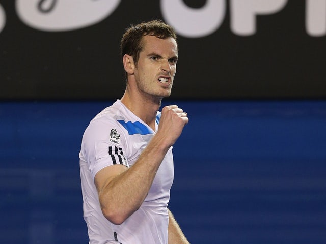 Andy Murray of Great Britain celebrates winning his second round match against Vincent Millot of France during day four of the 2014 Australian Open at Melbourne Park on January 16, 2014