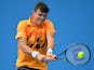 Canada's Milos Raonic plays a shot during his men's singles match against Romania's Victor Hanescu on day four of the 2014 Australian Open tennis tournament in Melbourne on January 16, 2014