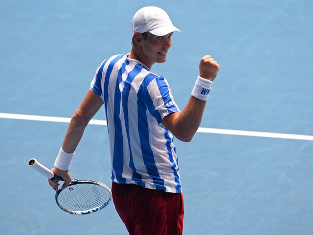 Czech Republic's Tomas Berdych celebrates his victory against Damir Dzumhur of Bosnia and Herzegovina during their men's singles match on day five of the 2014 Australian Open tennis tournament in Melbourne on January 17, 2014