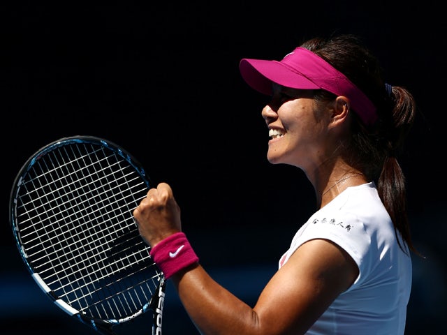 Li Na of China celebrates winning her third round match against Lucie Safarova of the Czech Republic during day five of the 2014 Australian Open at Melbourne Park on January 17, 2014