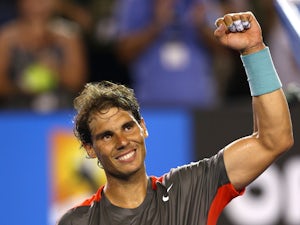 Nadal happy with "solid" win over Hewitt