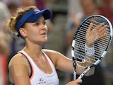 Agnieszka Radwanska of Poland celebrates her victory over Olga Govortsova of Belarus in their women's singles second round match on day four of the 2014 Australian Open tennis tournament in Melbourne on January 16, 2014