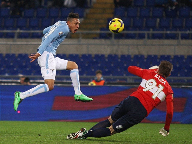 Lazio's Brayan Perea scores the opening goal against Parma during their Coppa Italia match on January 14, 2014