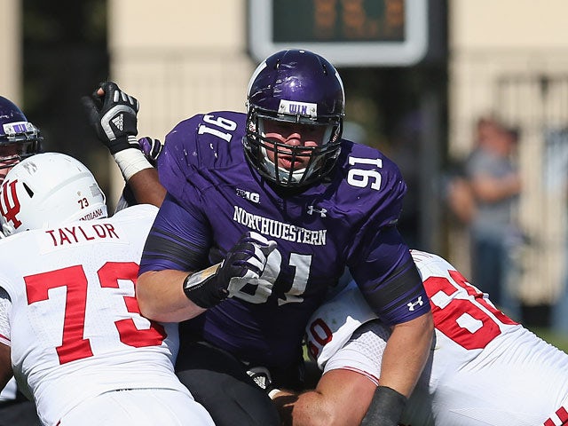 Brian Arnfelt #91 of the Northwestern Wildcats in action against Indiana Hoosiers on September 29, 2012