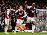 Carlton Cole of West Ham United and team mates celebrate as Newcastle United concede an own goal by Mike Williamson during the Barclays Premier League match on January 18, 2014