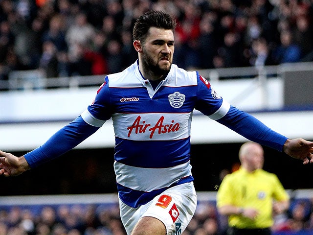 QPR's Charlie Austin celebrates after scoring the opening goal against Huddersfield during their Championship match on January 18, 2014
